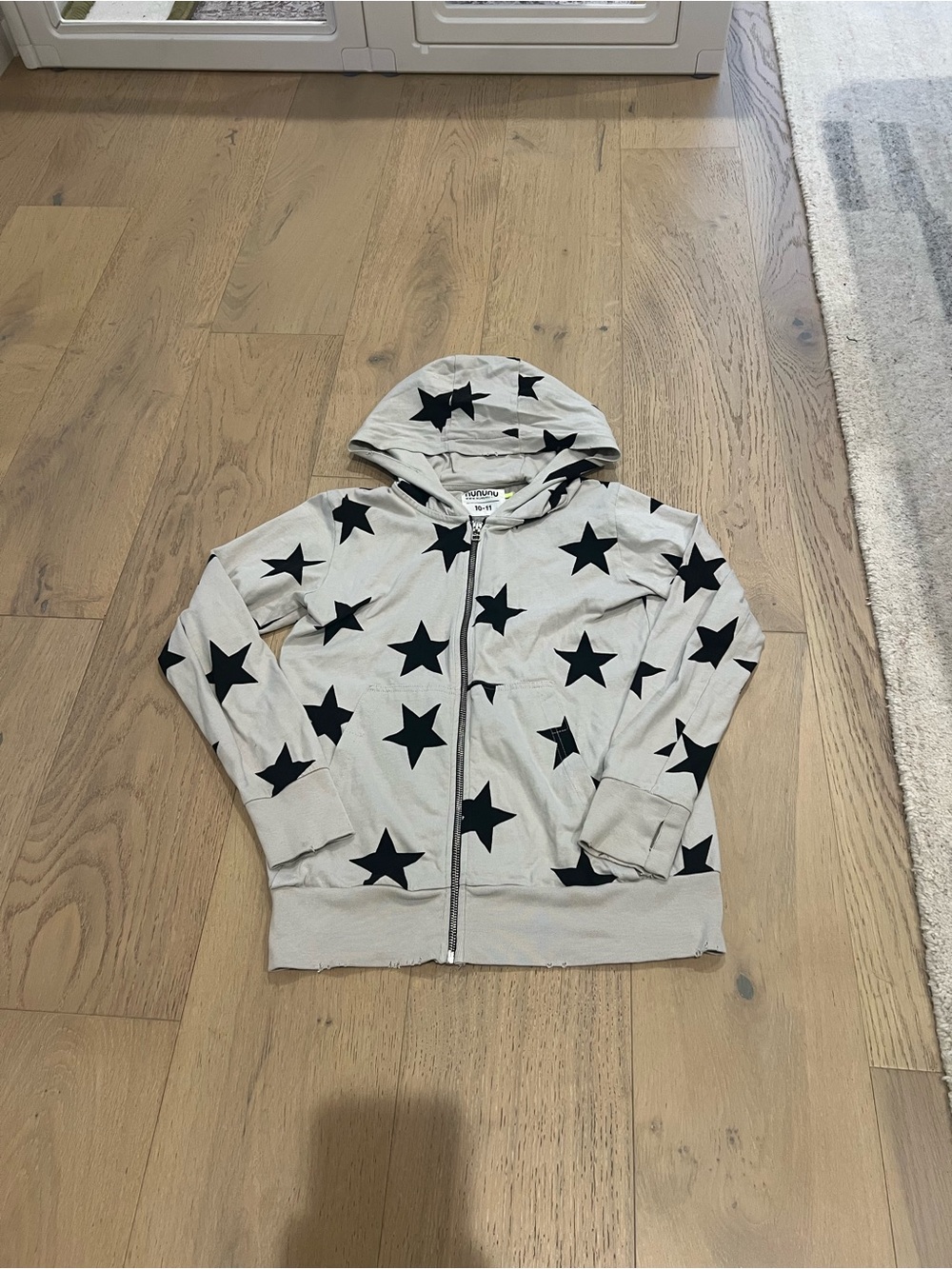Nununu Beige Zip-Up Hoodie with Black Star Print (youth 10-11)
